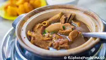 Malaysia famous food, bakuteh a Claypot Cooked Pork Rib Soup Model Released Property Released xkwx bakuteh malaysia meat meal food cuisine malaysian asian asia herbal herb cooking pork hot bowl soup traditional chinese rib lunch fresh rice popular bak kut teh pot healthy dinner famous serving