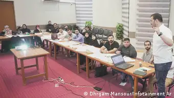 Mohammed Almoumin delivering a training in Najaf, Iraq.
