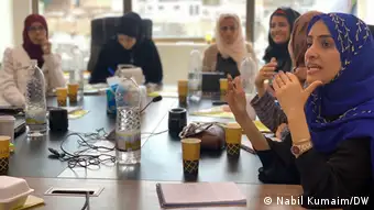 Women in discussion at a media training