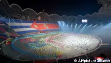 This Monday, Nov. 5, 2018 photo released Nov. 6, 2018, by the North Korean government shows the gymnastics and artistic performance as Cuban President Miguel Diaz-Canel and North Korean leader Kim Jong Un visited the May Day Stadium in Pyongyang, North Korea. Independent journalists were not given access to cover the event depicted in this image distributed by the North Korean government. The content of this image is as provided and cannot be independently verified. Korean language watermark on image as provided by source reads: KCNA which is the abbreviation for Korean Central News Agency. (Korean Central News Agency/Korea News Service via AP)