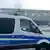 A police van outside the Tesla Gigafactory near Berlin