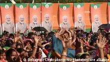 Prime Minister Narendra Modi is waving to supporters, including women BJP supporters, during a rally in Arambagh, Hooghly district, on March 1, 2024. (Photo by Debajyoti Chakraborty/NurPhoto)