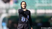 After the publication of a photo of Mahnaz Zakaei, among Persepolis fans at Azadi Stadium, the name of this female referee was crossed out from the list of Iranian derby referees.
Mahnaz Zakai's name was crossed out from the referees of the Persepolis and Esteghlal game