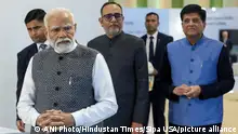 New Delhi, Feb 26 (ANI): Prime Minister Narendra Modi prior to the inauguration of the Bharat Tex 2024, one of the largest global textile events to be organised in the country, at Bharat Mandapam, in New Delhi on Monday. Union Minister of Commerce and Industry Piyush Goyal is also seen. (ANI Photo via Hindustan Times/Sipa USA)