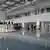 Distribuidor central del aeropuerto en el que destaca un gran cuadro de Sandino.