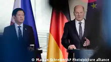 German Chancellor Olaf Scholz, right, and Philippine President Ferdinand Marcos Jr. brief the media after a meeting at the chancellery in Berlin, Tuesday, March 12, 2024. (AP Photo/Markus Schreiber)