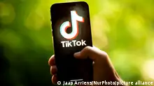 The TikTok logo is seen in this photo illustration on 22 August, 2023 in Warsaw, Poland. (Photo by Jaap Arriens/NurPhoto)