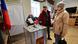 A man casts a ballot at a polling station during a presidential election in the Pacific port city of Vladivostok A man casts a ballot at a polling station during a presidential election in the Pacific port city of Vladivostok