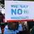 A demonstrator from the Coalition of Botswana Christian Churches holds a banner reading 'We say no to homosexuality'