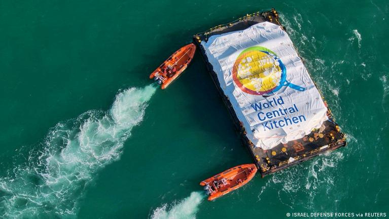 Supplies from the World Central Kitchen (WCK) barge arrives off the Gaza coast