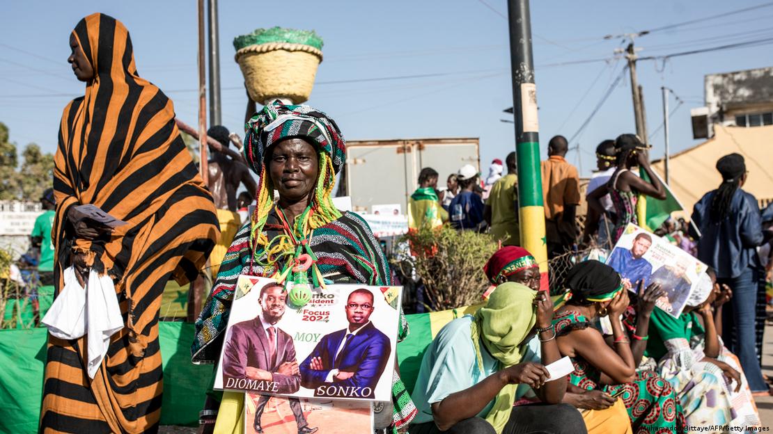 Young Senegalese voters have high expectations of the incoming government of Diomaye Faye and possibly Ousmane SonkoImage: Muhamadou Bittaye/AFP/Getty Images