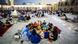 Muslims have a sunset meal in a mosque complex in Baghdad. Muslims have a sunset meal in a mosque complex in Baghdad.
