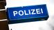 Znak na zgradi policije Znak na zgradi policije