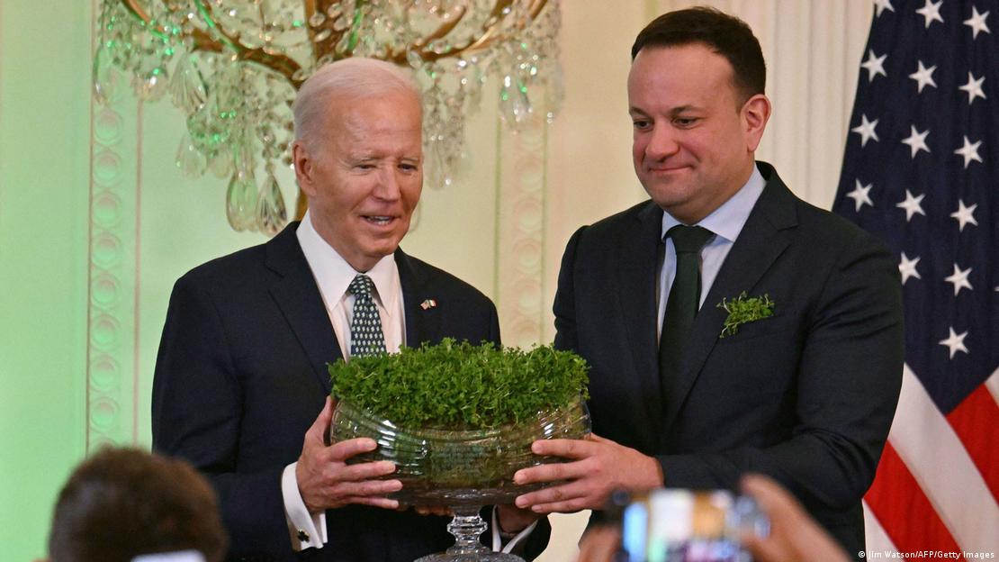Irish Taoiseach Leo Varadkar gifts a bouquet of Shamrocks to US President Joe Biden during a St. Patrick's Day Celebration.