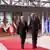 Guterres i Michel koračaju crvenim tepihom u pozadini zastave članica EU-a