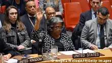 TOPSHOT - US Ambassador to the UN Linda Thomas-Greenfield casts a veto vote during a UN Security Council meeting on the Israel-Hamas war, at UN Headquarters in New York City on February 20, 2024. The US vetoed a UN Security Council resolution on Tuesday that called for an immediate ceasefire in Gaza, even as President Joe Biden faced mounting pressure to dial back support for Israel. (Photo by ANGELA WEISS / AFP) (Photo by ANGELA WEISS/AFP via Getty Images)