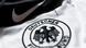 A Nike logo above the logo of the German national team A Nike logo above the logo of the German national team