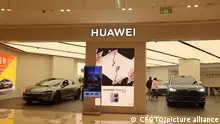 YICHANG, CHINA - MARCH 17, 2024 - Huawei Smart World S7 and AITO M9 new energy vehicles are displayed at a store in Yichang, Hubei province, China, March 17, 2024.