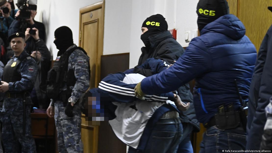 One of the suspects of the deadly terror attack on the Crocus City Hall is seen before appearing at the Basmanny District Court in Moscow