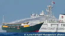 05.03.2024
Philippine resupply vessel Unaizah May 4 is hit by Chinese coast guard water canon blast causing injuries to multiple crew members as they tried to enter the Second Thomas Shoal, locally known as Ayungin Shoal, in the disputed South China Sea Tuesday, March 5, 2024. Chinese and Philippine coast guard vessels collided in the disputed South China Sea and multiple Filipino crew members were injured in high-seas confrontations Tuesday as Southeast Asian leaders gathered for a summit that was expected to touch on Beijing's aggression at sea. (AP Photo/Aaron Favila)