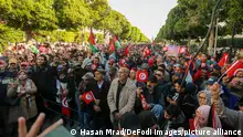 TUNIS - TUNISIA, JANUARY 14: Tunisian political parties took the streets and demonstrate against Tunisian President Kais Said on Revolution Day at Habib Bourguiba Street, demanding resignation of the Tunisian President in Tunis,Tunisia on January 14, 2024. Demonstrators marched against the seizure of near total power by the Tunisian president, Kais Saied, demanding he step down as they marked the anniversary of the 2011 revolution that brought democracy. (Photo by Hasan Mrad/DeFodi Images News)