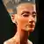 El busto de la reina Nefertiti de medio perfil