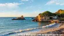 Beach Torre Sant'Andrea and islet Scoglio the Tafaluro, Otranto region, Salento Adriatic sea coast, Puglia, Italy