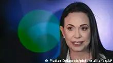 Opposition presidential hopeful Maria Corina Machado gives a press conference at her campaign headquarters in Caracas, Venezuela, Friday, Dec. 15, 2023. (AP Photo/Matias Delacroix)