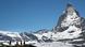 Tourists taking photos in front of the Matterhorn mountain in Zermatt Tourists taking photos in front of the Matterhorn mountain in Zermatt
