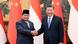 Presidentes Prabowo Subianto (Indonésia) e Xi JInping (China) apertam-se as mãos em Pequim Presidentes Prabowo Subianto (Indonésia) e Xi JInping (China) apertam-se as mãos em Pequim