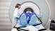 A person is inserted into an MRI machine A person is inserted into an MRI machine