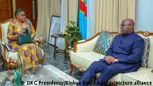 02/04/2024 *** (240402) -- KINSHASA, April 2, 2024 (Xinhua) -- President Felix Tshisekedi (R) of the Democratic Republic of the Congo (DRC) meets with the new prime minister Judith Tuluka Suminwa in Kinshasa, the Democratic Republic of the Congo, on April 1, 2024. Judith Tuluka Suminwa has been appointed as the new prime minister of the Democratic Republic of the Congo (DRC), the country's presidential office said late Monday. Suminwa, formerly the minister of planning since March 2023, has made history as the first woman to serve as prime minister in the country. (DRC Presidency/Handout via Xinhua)