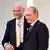 Глава компанії Knauf Ніколаус Кнауф вітає Володимира Путіна на конгресі ділових кіл