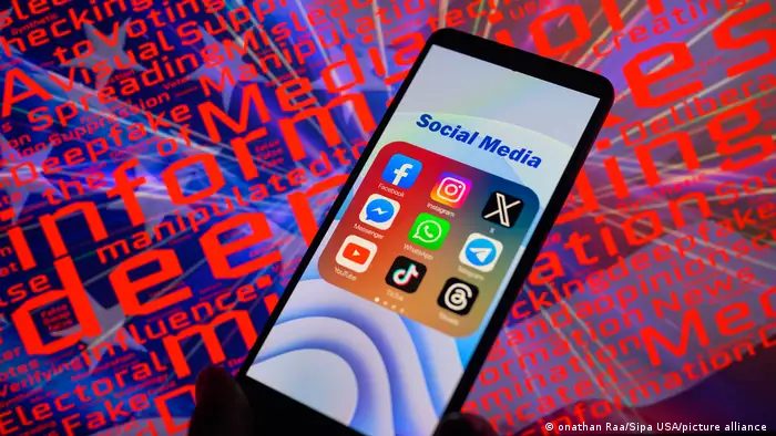 Social media app icons displayed on a smartphone with a word cloud visible in the background 