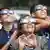 People watch an eclipse with special protective glasses
