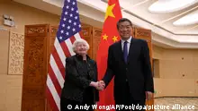 U.S. Treasury Secretary Janet Yellen, left, shakes hands with Chinese Vice Premier He Lifeng during a meeting at the Guangdong Zhudao Guest House in southern China's Guangdong province, Friday, April 5, 2024. Yellen has arrived in China for five days of meetings in a country that's determined to avoid open conflict with the United States. (AP Photo/Andy Wong, Pool)