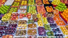 Fruit packaged in plastic or arranged in cardboard boxes