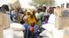 People in Darfur receiving food aid from the WFP in March People in Darfur receiving food aid from the WFP in March