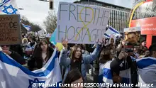 In Berlin, Germany, on February 25, 2024, a significant demonstration unfolded as pro-Israel protesters gathered to voice their support for Israel. The gathering, characterized by a sea of Israeli flags and signs bearing messages such as against antisemitism, bring the hostages home, and free Gaza from Hamas, showcased a unified stand against antisemitism and in solidarity with the hostages held by Hamas. Rabbi Yehuda Teichtal, a prominent figure in the Jewish community of Berlin and president of the Chabad Jewish Education Centre, delivered a poignant speech during the protest. Rabbi Teichtal emphasized the collective resolve of the attendees, stating, We stand here together, for the hostages, to bring them all home. His words resonated with the crowd, reinforcing the demand for the immediate release of all hostages and calling for an end to the violence. (Photo by Michael Kuenne/PRESSCOV/Sipa USA)
