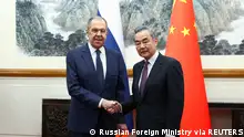 09.04.2024+++ Russia's Foreign Minister Sergei Lavrov shakes hands with China's Foreign Minister Wang Yi during a meeting in Beijing, China April 9, 2024. Russian Foreign Ministry/Handout via REUTERS ATTENTION EDITORS - THIS IMAGE WAS PROVIDED BY A THIRD PARTY. NO RESALES. NO ARCHIVES. MANDATORY CREDIT.