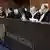द हेग की अंतरराष्ट्रीय अदालत में जर्मनी की दलीलों को सुनते जज