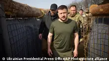 April 9, 2024**In this photo provided by the Ukrainian Presidential Press Office, Ukrainian President Volodymyr Zelenskyy inspects the fortification lines in Kharkiv region, Ukraine, Tuesday, April 9, 2024. (Ukrainian Presidential Press Office via AP)