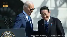President Joe Biden, left, shakes hands with Japanese Prime Minister Fumio Kishida during a State Arrival Ceremony on the South Lawn of the White House, Wednesday, April 10, 2024, in Washington. (AP Photo/Susan Walsh)