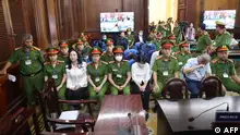 11.04.2024+++ Vietnamese property tycoon Truong My Lan (front row 3nd L) looks on at a court in Ho Chi Minh city on April 11, 2024. A top Vietnamese property tycoon could face the death penalty when she and dozens of other co-accused face verdicts on April 11 in one of the country's biggest fraud cases over the embezzlement of USD 12.5 billion. (Photo by AFP)