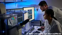 Scientists in laboratory using computer, 30.11.2016, Copyright: xMattxLincolnx, model released, wearing,using,working late,cooperation,innovation,teamwork,scientific equipment,20 to 24 years,caucasian ethnicity,mixed race ethnicity,multi-ethnic group,female,woman,young woman,male,man,young man,colleague,two people,medical student,medical occupation,scientist,indoors,laboratory,lab coat,computer,medicine,science,biochemistry,advancement,both male and female,analyzing,research and development,biochemist,medical research,research facility,December 2016 Release,science and technology,Analysing,Working,Working Late,Caucasian Ethnicity,Mixed Race Person,Multi-Ethnic Group,Young Adult,20-24 Years,Female,Women,Young Women,Male,Men,Young Men,Busi Ref:IS09B39S2