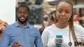 DW reporters George Okach and Flourish Chukwurah are seen onscreen