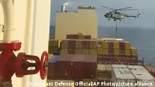 13/04/2024*This image made from a video provided to The Associated Press by a Mideast defense official shows a helicopter raid targeting a vessel near the Strait of Hormuz on Saturday, April 13, 2024. A video seen by The Associated Press shows commandos raiding a ship near the Strait of Hormuz by helicopter Saturday, an attack a Mideast defense official attributed to Iran amid wider tensions between Tehran and the West. The Mideast defense official spoke on condition of anonymity to discuss intelligence matters. (AP Photo)