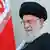 Iranian Supreme Leader Ayatollah Ali Khamenei with the Iranian flag in the background