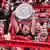 Ein Leverkusener Fans hält auf der Tribüne eine Nachbildung der Meisterschale in die Höhe