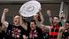 Bayer Leverkusen players celebrate, holding the Bundesliga trophy aloft, after Sunday's 5-0 win over Werder Bremen, which also mathematically secured them the league title. Leverkusen, April 14, 2024. Bayer Leverkusen players celebrate, holding the Bundesliga trophy aloft, after Sunday's 5-0 win over Werder Bremen, which also mathematically secured them the league title. Leverkusen, April 14, 2024.